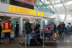 Passengers at Ngurah Rai airport in Bali resort island, Indonesia (File photo: AFP/VNA)