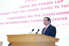 PM Pham Minh Chinh addresses the conference on the establishment of the International Financial Centre (IFC) in Vietnam on December 21. (Photo: VNA)