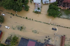 An area flooded following heavy rains in Aceh province of Indonesia (Photo: Xinhua/VNA)