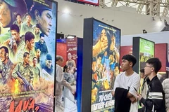 Posters of "Red Rain" and "Hijacked" at the Autumn Fair 2025 (Photo: VNA)