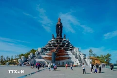 A Buddha statue on Ba Den Mountain. The mountain in Tay Ninh is one of the most popular tourist destinations in the country, attracting large numbers of visitors from across Vietnam. (Photo: VNA)