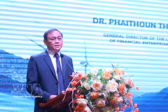 An official from the Lao Ministry of Finance addresses the workshop in Vientiane on April 24. (Photo: VNA)