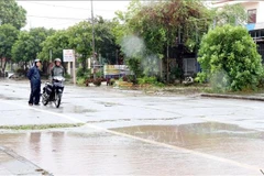 Residents in Ninh Binh province are unable to travel due to severe flooding caused by storm Wipha-triggered rain. (Photo: VNA) 