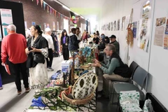 Communities at the festival showcase distinctive cultural products from their countries. (Photo: VNA)