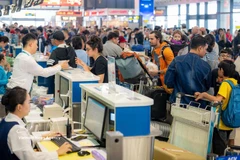 Noi Bai International Airport activates plans to accommodate rising passenger volumes during the 2026 Tet holiday. (Photo: VietnamPlus)