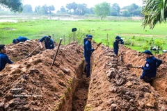 Team K91 under the Dong Thap provincial Military Command search for martyrs’ remains in Cambodia. (Photo: VNA) 