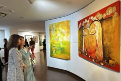 Visitors at the exhibition (Photo: VNA) 