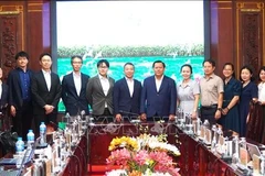 Officials of Tay Ninh province and the Japanese delegation pose for a photo at the meeting on November 26. (Photo: VNA) 