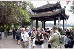 Tourists at Ngoc Son temple (Photo: VNA)