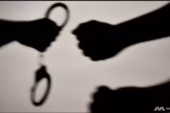 Photo illustration of handcuffs. (Photo: CNA) 