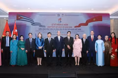 Delegates at the ceremony marking the 65th anniversary of the establishment of diplomatic relations between Vienam and Cuba, held in HCM City on December 9. (Photo: VNA)