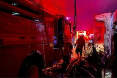 Indonesia's Kompas TV reported that the fire has been extinguished while evacuation efforts continue. (Photo: AFP ) 