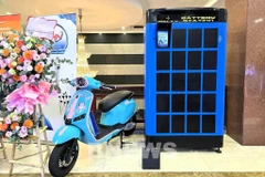 Selex's electric motorcycles and battery-swapping station model (Photo: VNA) 
