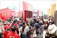 Tens of thousands of visitors flocked to the exhibition over the weekend. (Photo: VNA)