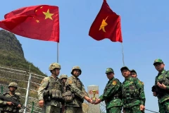 Vietnam and China carry out a joint border patrol. (Photo: VNA)