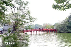 The Huc Bridge spanning Hoan Kiem Lake, an icon of Hanoi (Photo: VNA)
