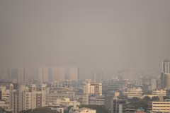 Skyscrapers are seen shrouded by polluted air in Jakarta (Photo: AFP)