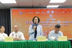 The organising committee answers reporters’ questions at the press briefing. (Photo: nhandan.vn) 