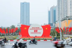 Posters and flags welcoming the 14th National Party Congress. (Photo: VNA) 
