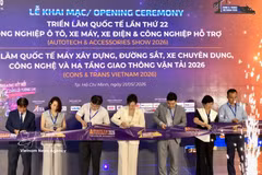 Delegates cut the ribbon to open the exhibition series on May 21, 2026 (Photo: VNA) 