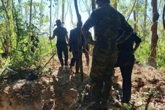 The K53 Team of the Quang Ngai provincial military command carries out search and recovery operations for the remains of fallen soldiers in Laos. (Photo: VNA) 