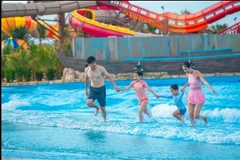 Visitors enjoy activities at Aqua Adventure Water Park in Rach Dua ward, Ho Chi Minh City. (Photo: SGGP)