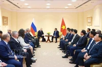 Prime Minister Pham Minh Chinh meets with President of the Russia–Vietnam Friendship Association (RVFA) Vladimir Petrovich Buyanov, and Nikolay Nikolaevich Kolesnik, Chairman of the Russian War Veterans' Association (RWVA), who had fought in Vietnam, in Moscow on March 25 (Photo: VNA)