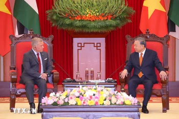 Party General Secretary To Lam and King Abdullah II Ibn Al Hussein of Jordan (Photo: VNA)