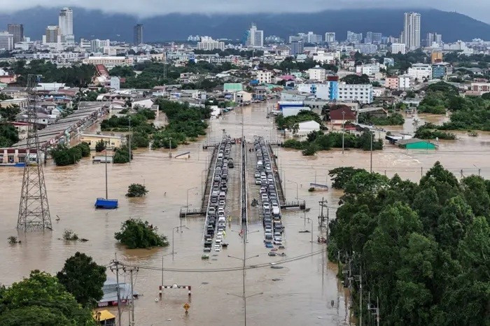 A drone view showing cars parked on a bridge to escape floodwaters in a flooded area in Hatyai district, affected by heavy rainfall, which impacts 10 provinces in southern Thailand and kills several people, in Songkhla province, on November 25, 2025. (Photo: Reuters)