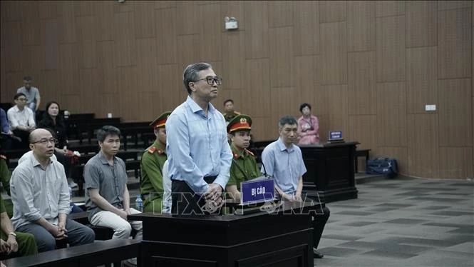 Former Deputy Minister of Industry and Trade Hoang Quoc Vuong at the court hearing on April 21, 2025. (Photo: VNA)