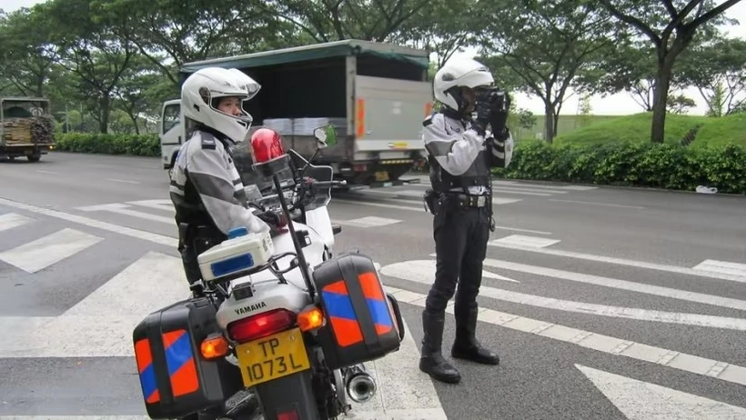  Singapore Traffic Police officers conducting enforcement against speeding on an expressway. (Photo: Singapore Police Force)