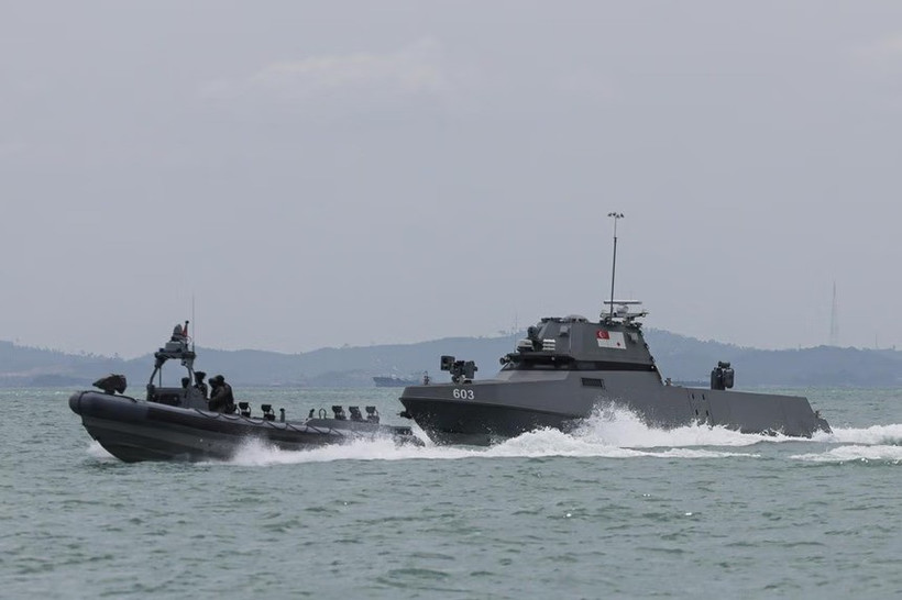 Singapore Navy's new maritime security unmanned surface vessel (right) chasing a suspicious vessel during a demonstration at Changi Naval Base on February 4. (Photo: The Strait Times)