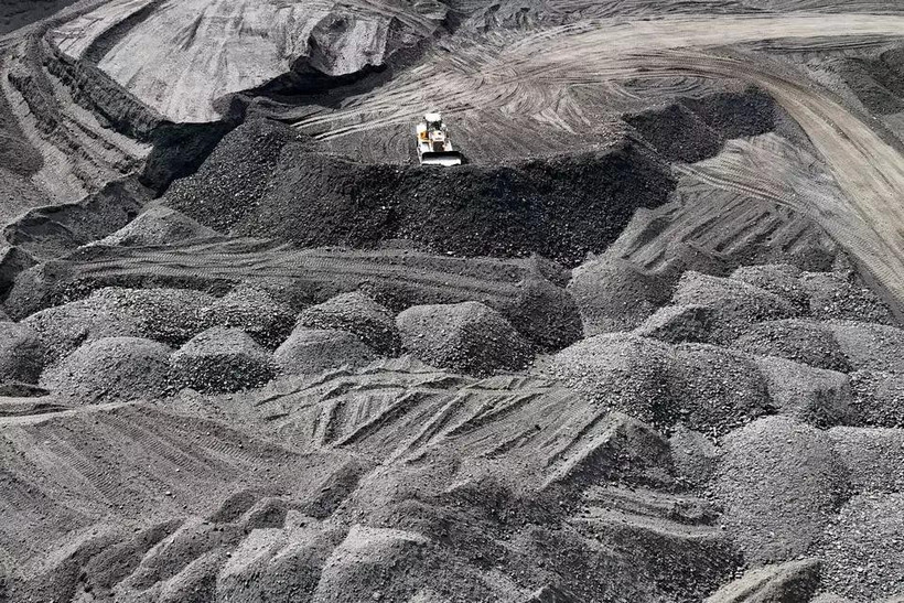 An aerial photo shows heavy vehicles and machinery being operated to collect coal along the coast of Peunaga Cut Ujong, Meureubo district, Aceh, on January 9, 2026. (Photo: Antara)