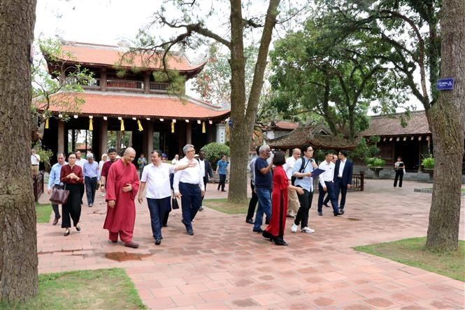 Delegates tour the Con Son relic site in Hai Duong province on May 16. (Photo: VNA)
