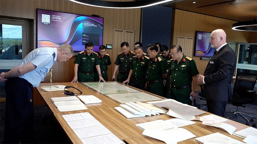  National Steering Committee 515 holds a working session with the Australian Army's Unrecovered War Casualties Unit. (Photo: qdnd.vn)