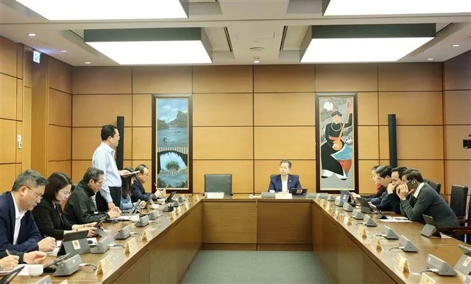 The National Assembly holds group discussions during the extraordinary session on February 14. (Photo: VNA)