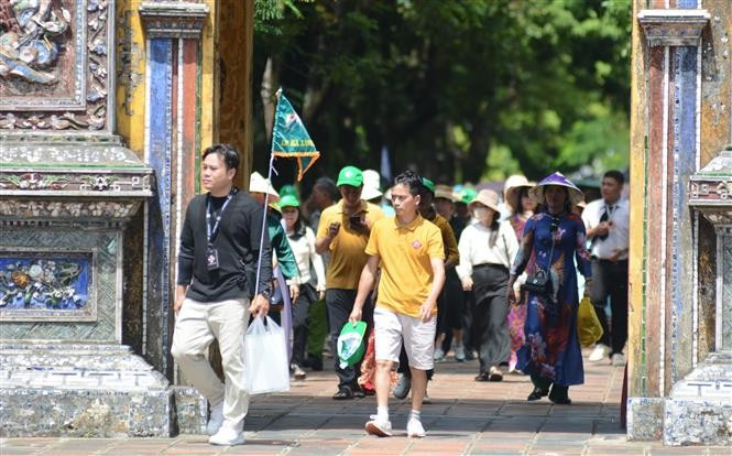 Tourists at the Hue Imperial Citadel (Photo: VNA)