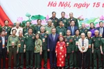 Party General Secretary To Lam and exemplary veteran revolutionaries, war heroes, and policy beneficiaries from northern Vietnam at the meeting in Hanoi on April 15 (Photo: VNA)
