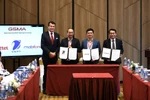 Representatives of MobiFone, Viettel, and VNPT at the signing ceremony of a memorandum of understanding on their cooperation under the GSMA Open Gateway initiative. (Photo: laodong.vn)
