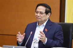 Prime Minister Pham Minh Chinh speaks in a group discussion as part of the National Assembly’s 9th extraordinary session on February 15 morning. (Photo: VNA)