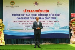 French Ambassador to Vietnam Olivier Brochet speaks at the event. (Photo: VNA)