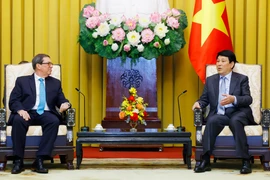 State President Luong Cuong (R) hosts a reception in Hanoi on February 19 for visiting Cuban Foreign Minister Bruno Rodríguez Parrilla. (Photo: VNA)