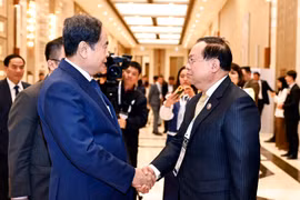 National Assembly Chairman Tran Thanh Man meets with Chairman of the Lao National Assembly's Committee for Foreign Affairs Sanya Praseuth in Uzbekistan on April 6. (Photo: VNA)