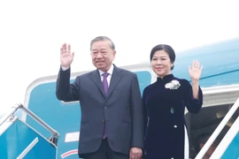 Party General Secretary To Lam and his spouse leave Hanoi on December 1 for a state visit to Laos. (Photo: VNA)