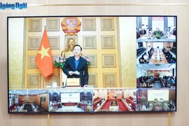 Deputy Prime Minister Tran Hong Ha speaks at the online meeting with leaders of provinces and cities regarding emergency response efforts to the 15th storm. (Photo: VNA)