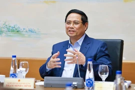 Prime Minister Pham Minh Chinh speaks at a group discussion within the National Assembly's 10th session. (Photo: VNA)