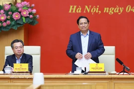 Prime Minister Pham Minh Chinh, Secretary of the Government Party Committee, speaks at the event. (Photo: VNA)