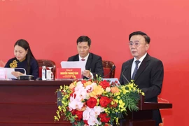 Politburo member and Permanent member of the Party Central Committee’s Secretariat Tran Cam Tu speaks at the press conference in Hanoi on January 14. (Photo: VNA)