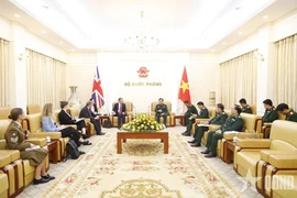 At the meeting between Deputy Defence Minister Senior Lieutenant General Hoang Xuan Chien and Second Permanent Secretary at the UK Home Office Simon Ridley in Hanoi on March 4. (Photo: VNA)