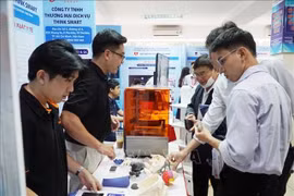 An exhibition event is held in Ho Chi Minh City on July 31 to promote digital technology solutions in healthcare. (Photo: VNA)